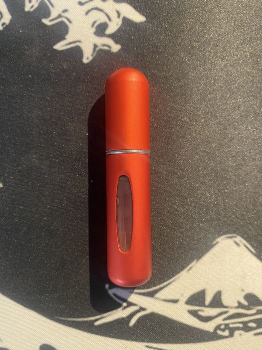 Porta perfume portatil