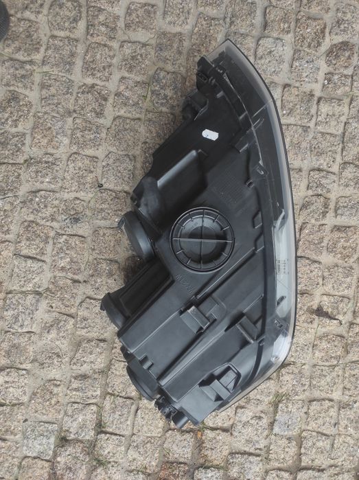 Farol esquerdo Volkswagen Polo IV
