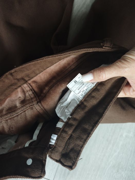 Джинси утеплені нові коричневі М,38