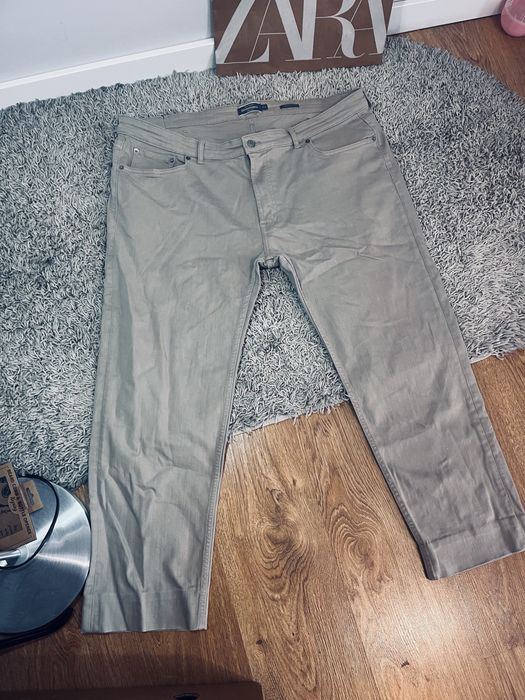 Meskie spodnie jeansy bezowe Dressmann rozm 42/43