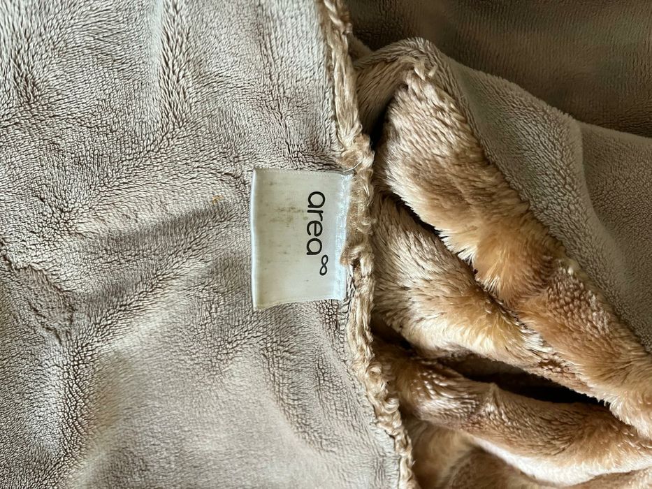 Manta tapa-pés decorativa