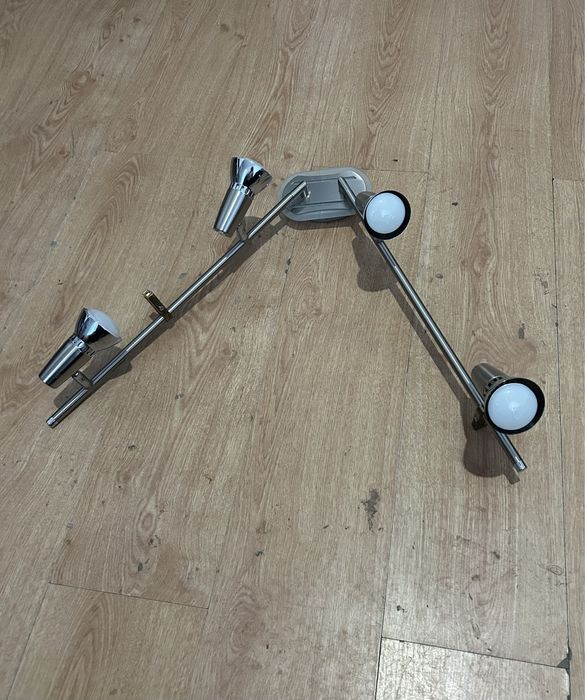 Світильник з поворотніми флаконами