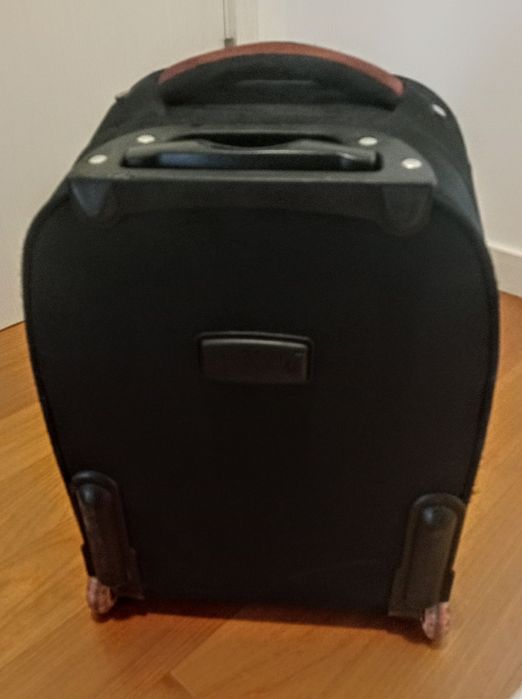 Trolley com mola da pega estragada