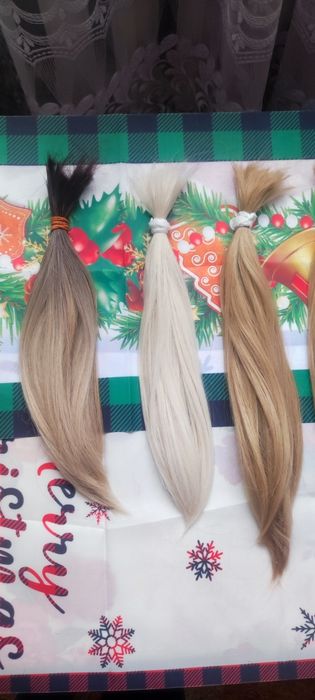 Слов'янське волосся для нарощування та загущення.