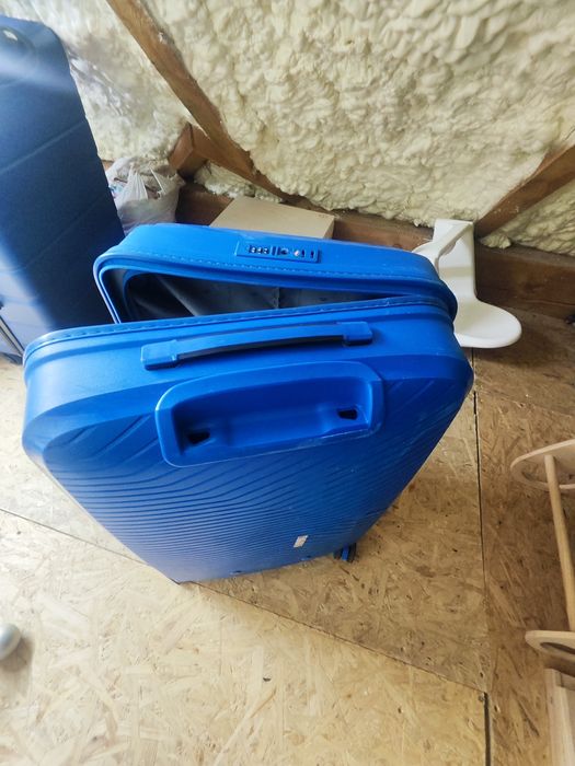 Walizka Puccini uszkodzona wysuwana rączka