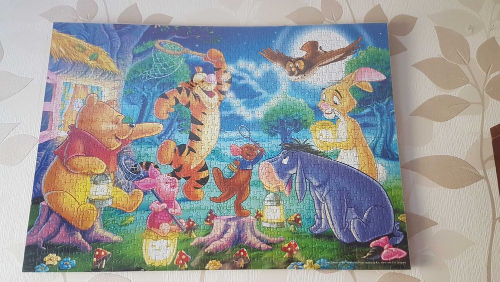Puzzle w antyramie 1000 el. Ravensburger Kubuś Puchatek łapie świetlik