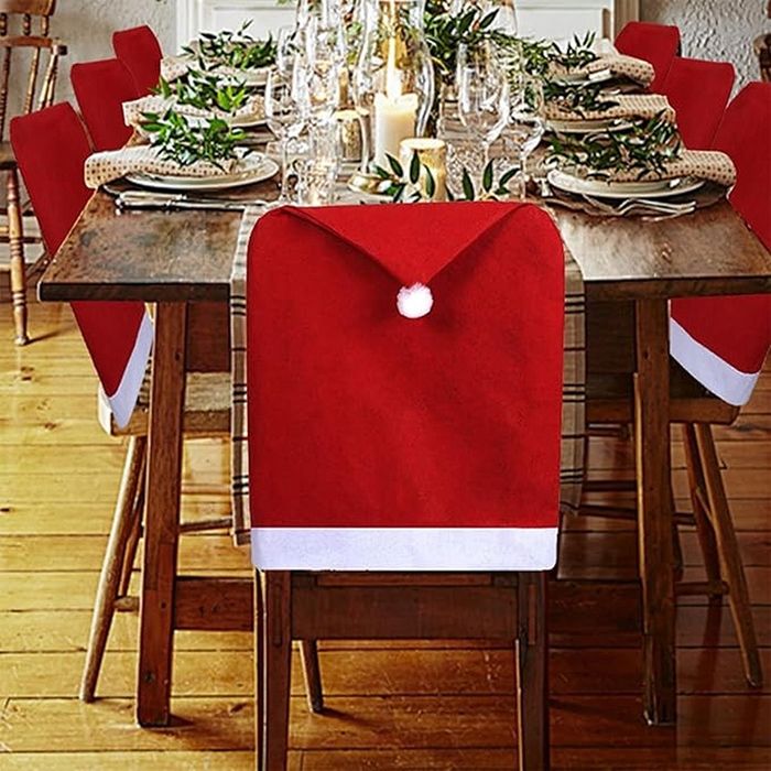 Pokrowce na krzesła 4 szt czapka Mikołaja 50x60cm świąteczne