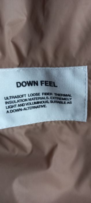 Продам женский пуховик 100%пух.фирма DEKKER из Италии