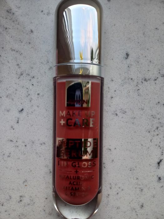 Błyszczyk-serum z peptydami Nourish Nude Avon