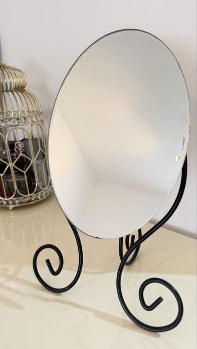 Espelho oval reclinavel