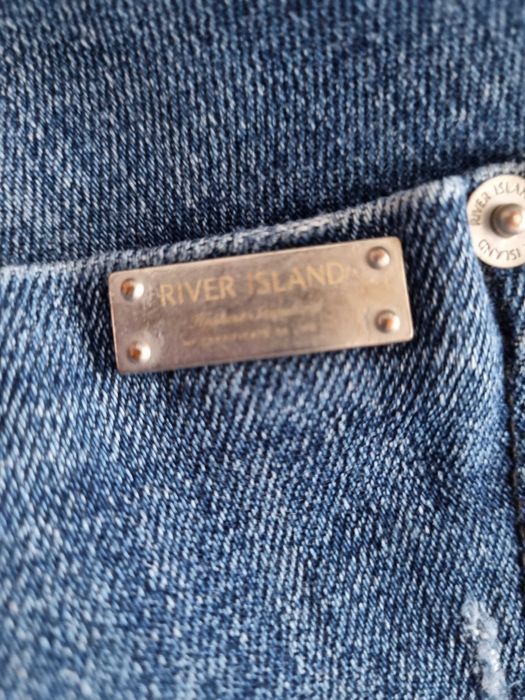Spodnie z dziurami River Island 38(M)