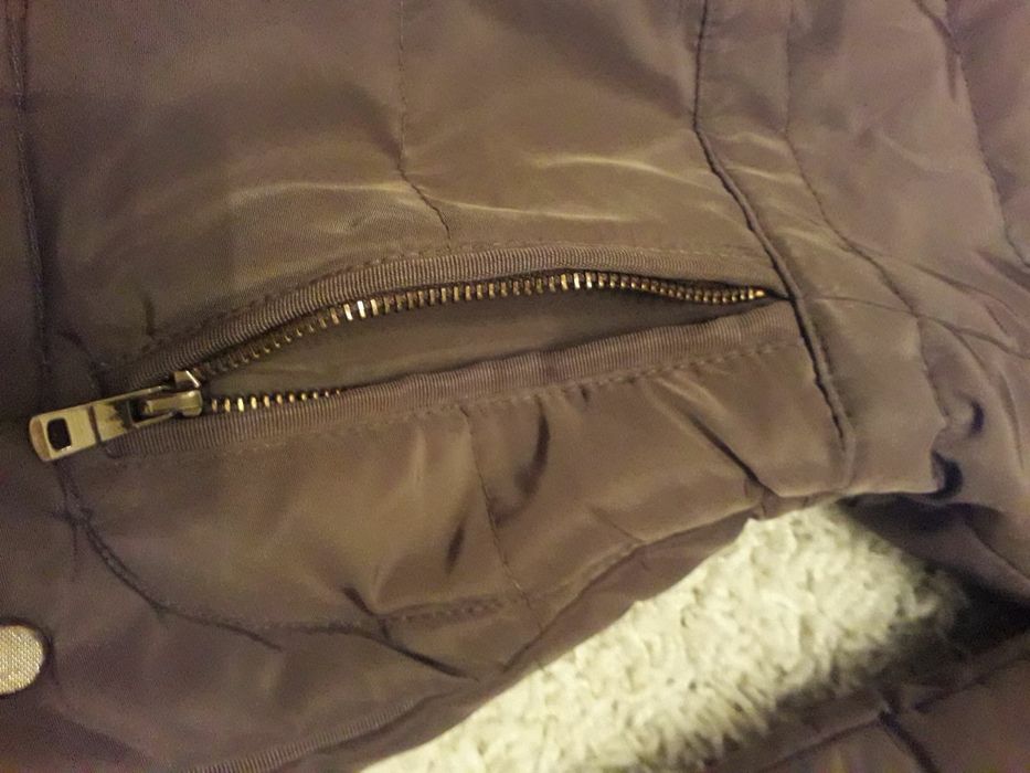 Женский пуховик Zara.