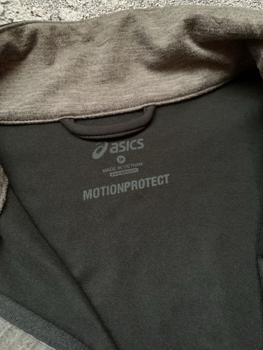 Технологічна вітровка Asics відштовхує воду і світло стан ідеал!