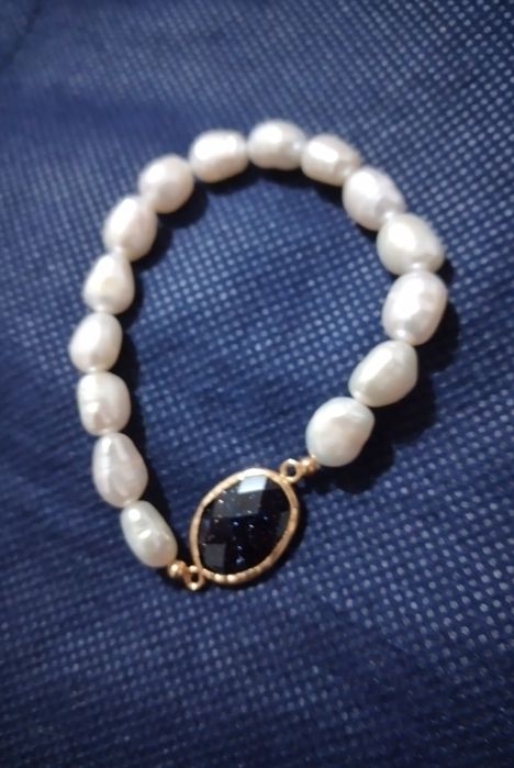 Pulseira de pérolas com prata