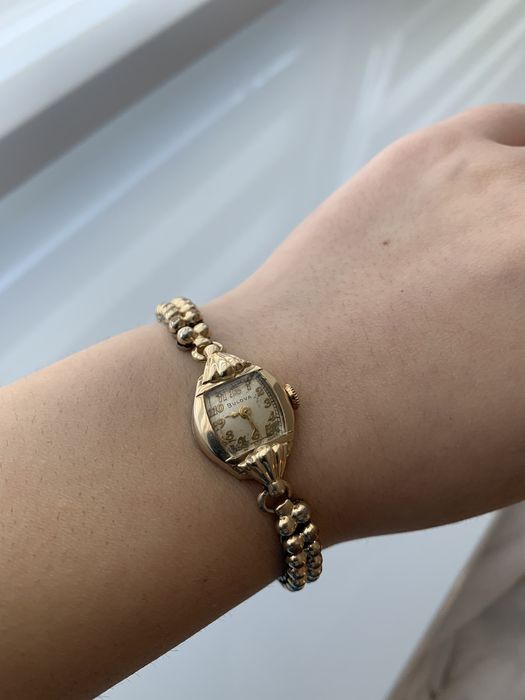 Позолочений годинник Bulova L2