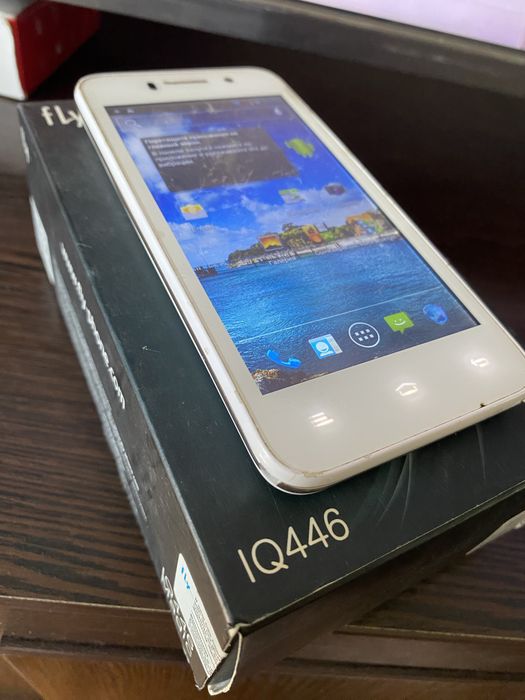 Смартфон Fly IQ 446 Magic телефон