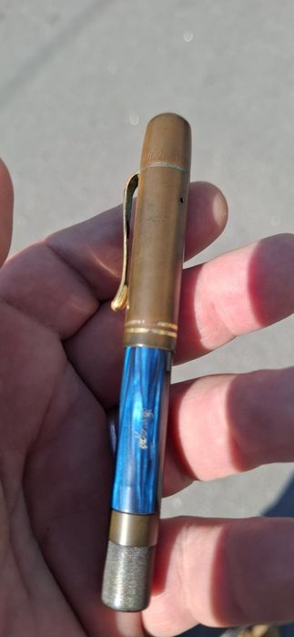 Caneta pelekan emege aparo ouro 14k