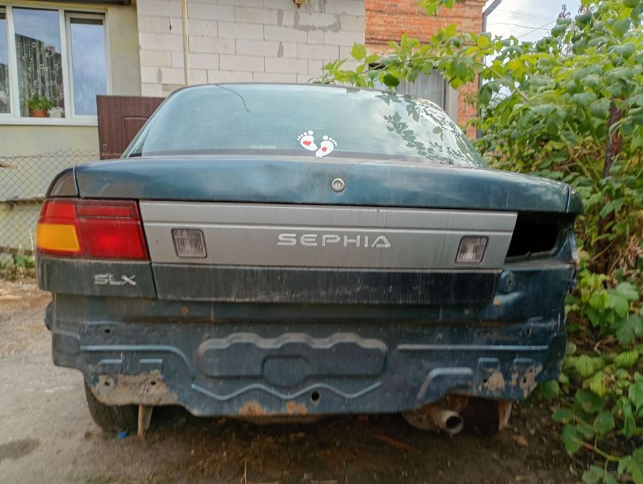 авто kia sephia 1.5