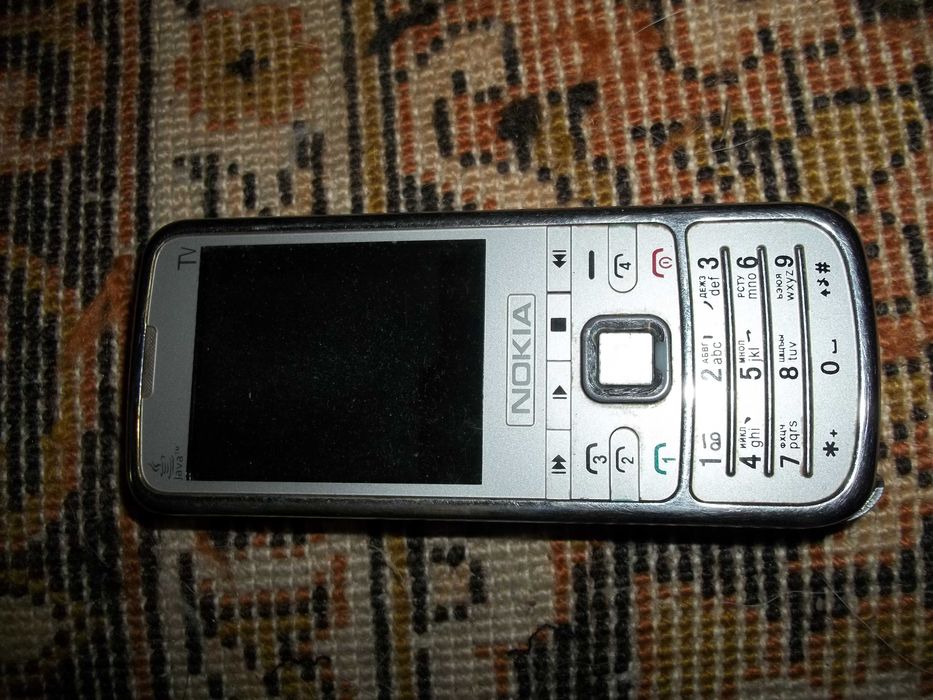 телефон 6700 4 сим карты (как новый