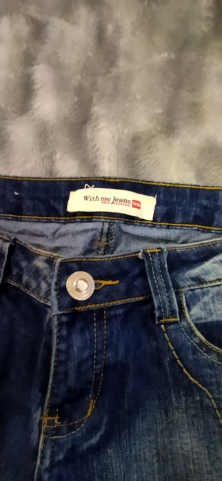 Джинсы с вышивкой средняя посадкой 48р