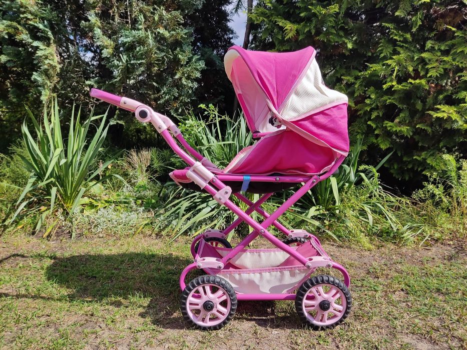 Różowy wózek dla lalek