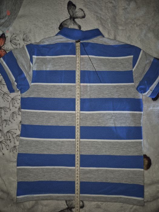 Продам футболку -поло ,безрукавку -жилетку Benetton.