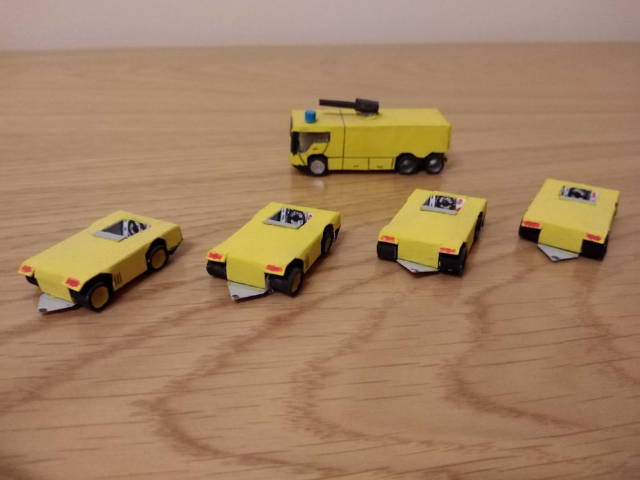 Conjunto de veículos de apoio a aeroporto em papel