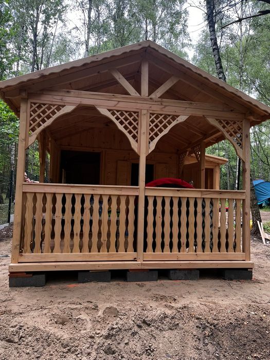 Domek drewniany, ogrodowy z drewutnią i dobudową