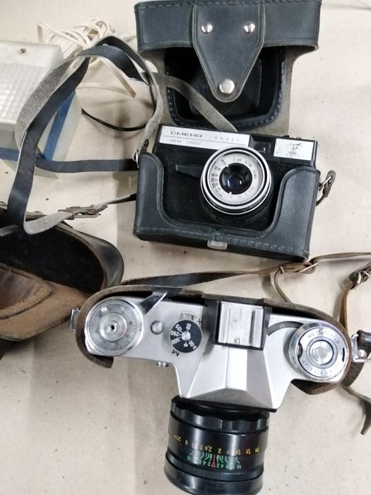 Фотоапарати Зеніт Е, Смєна символ