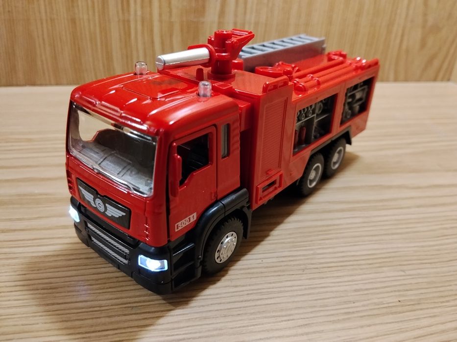 Модель Камаз пожарный  автоэвакуатор Автопром металл свет звук инерция