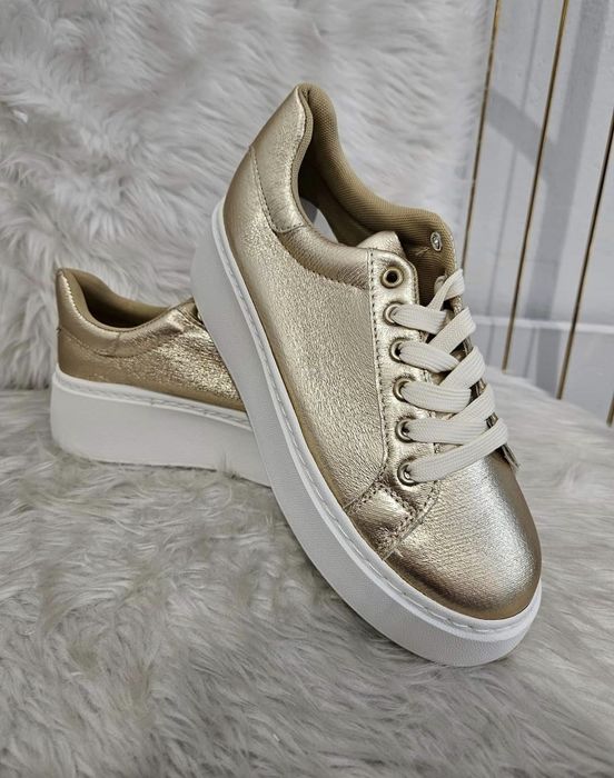 Nowe złote buty na platformie 40