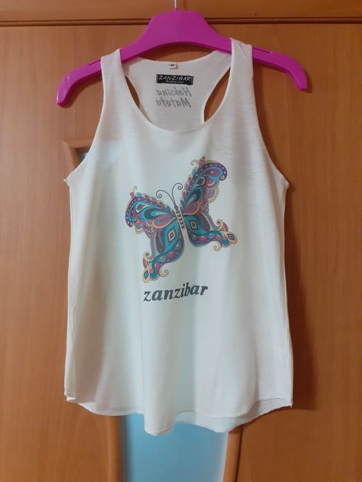 Майка      Zanzibar