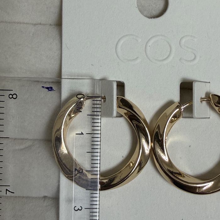 Сережки кільця Cos золотисті