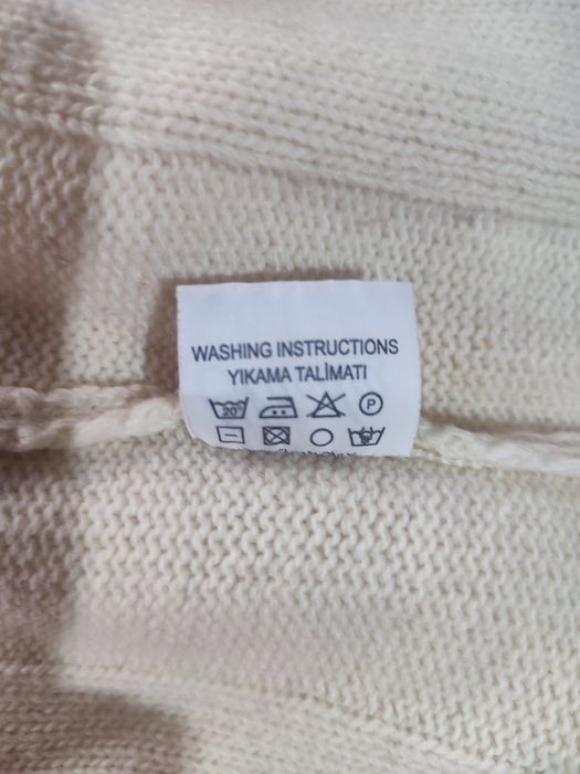 Светр кремовий з шерсті