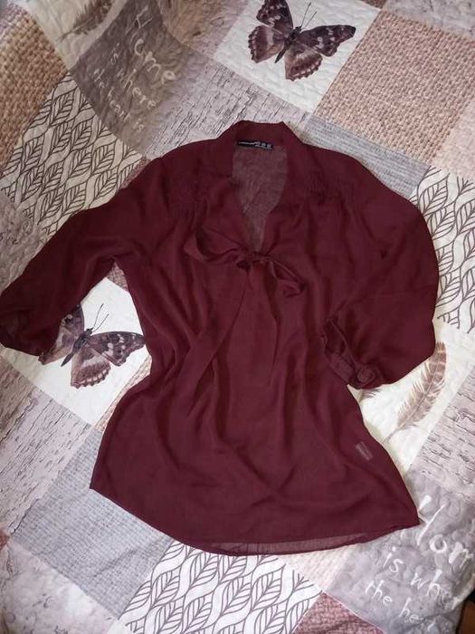 Elegancka bluzka z kokardą