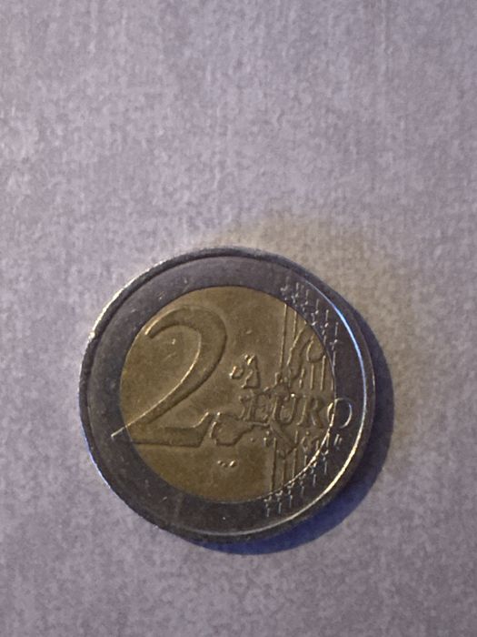 Moeda de 2 euros ano 2002 ( com defeito )