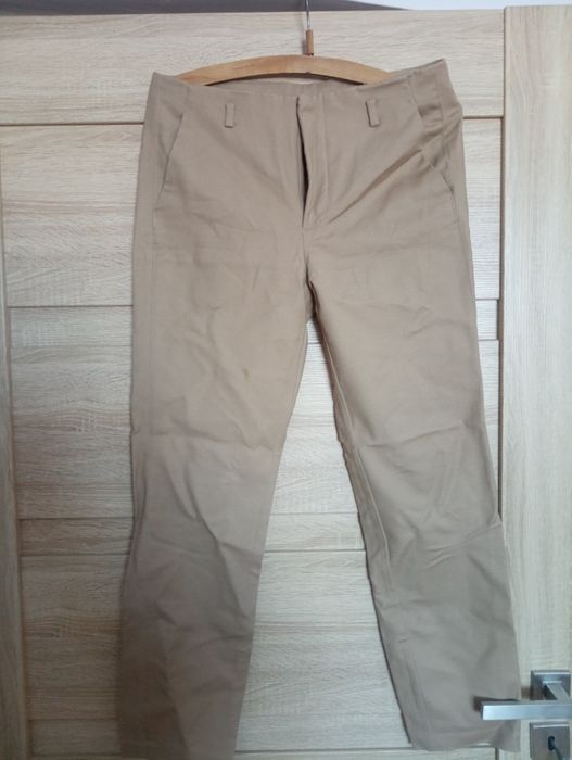 Beżowe spodnie biurowe 38