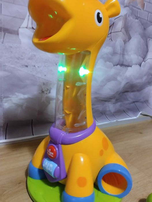 Zabawka edukacyjna Bright Starts Spin & Giggle Giraffe żyrafa fontanna