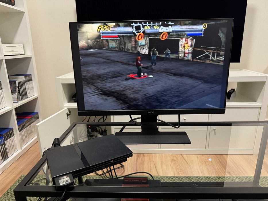 Playstation 2 slim preta com jogos!