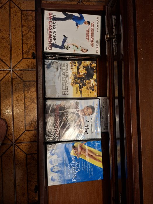 55 DVD alguns ainda enpacotados