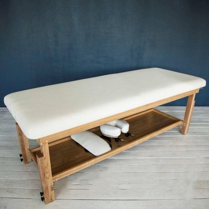 Стаціонарний масажний стіл. Кушетка косметична