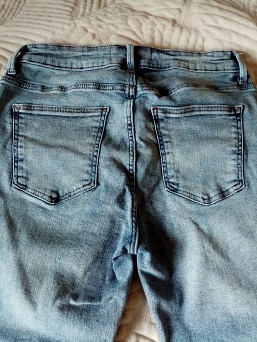 Spodnie jeansy Reserved 38