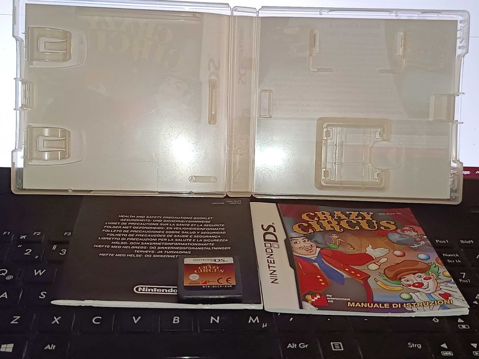 Nintendo DS Pink na caixa e 4 jogos