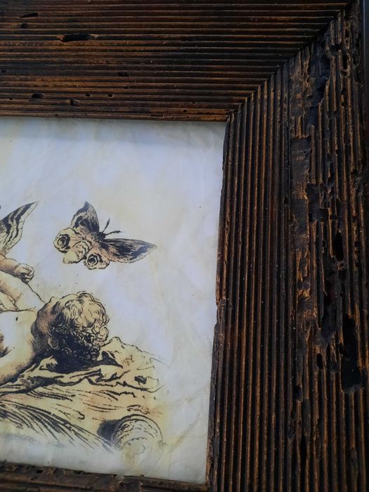 Obraz w ramce ze stuletnich bali