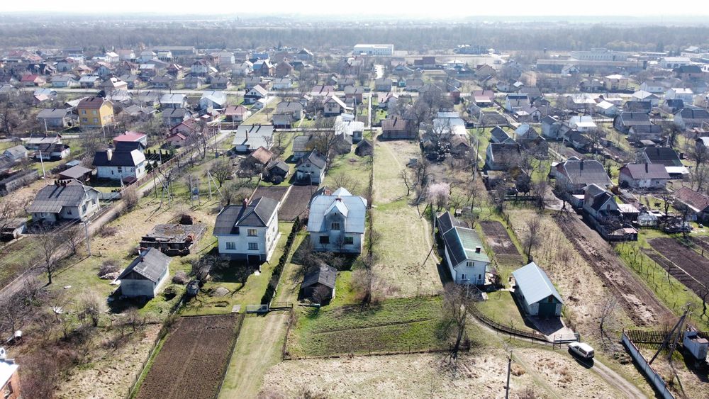 Ділянки 24 сот.землі та будинку  по вул. Шашкевича 150 у с. Дуліби