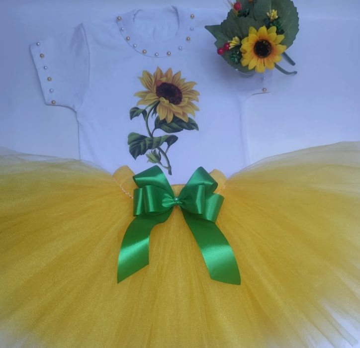 Костюм ,соняшник ,фіалка ,ромашка , .квіточки