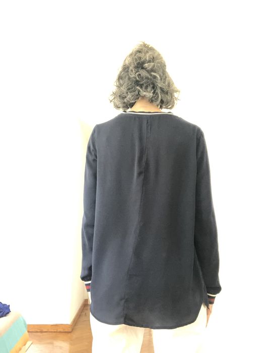 Blusa acetinada Springfield