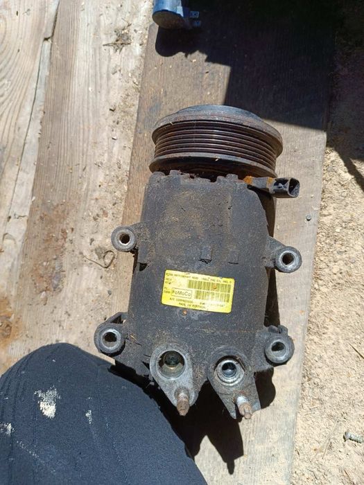 Компресор кондиціонера Форд Ford 19D629-BB