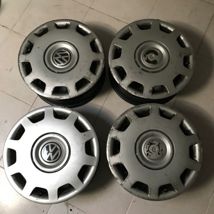 4 Jantes originais de VW Passat Variant de 2000 com tampões