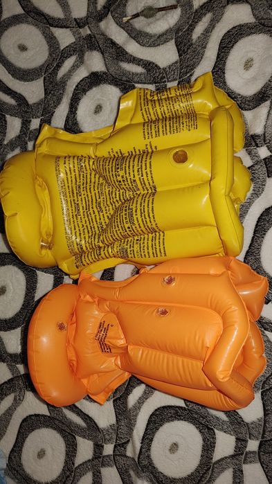 Жилети для купання дитячі